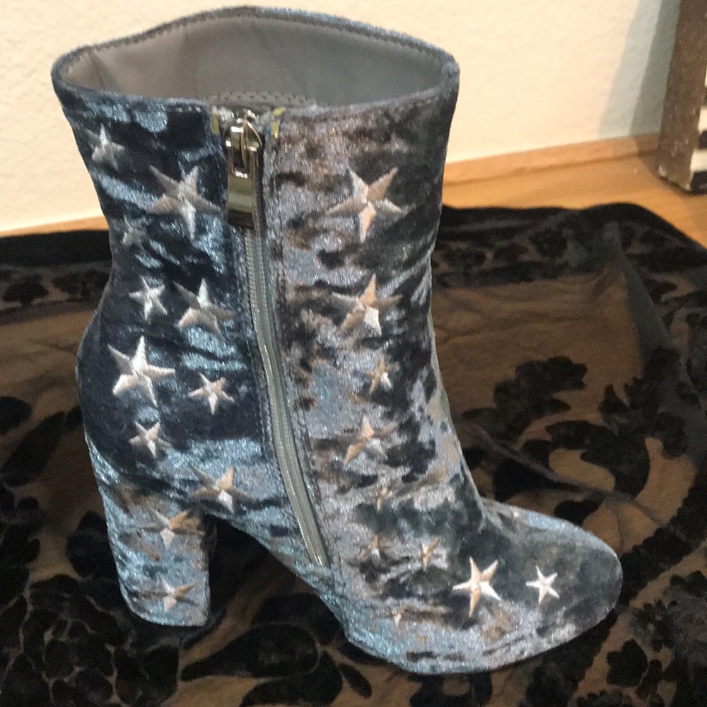 Blue star chunky heel boots.